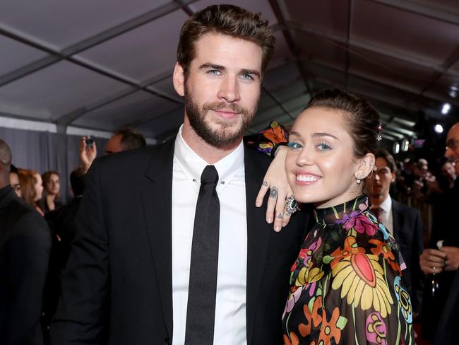 Hemsworth and Cyrus at the world premiere of Thor: Ragnarok in Hollywood in October 2017. Picture Getty