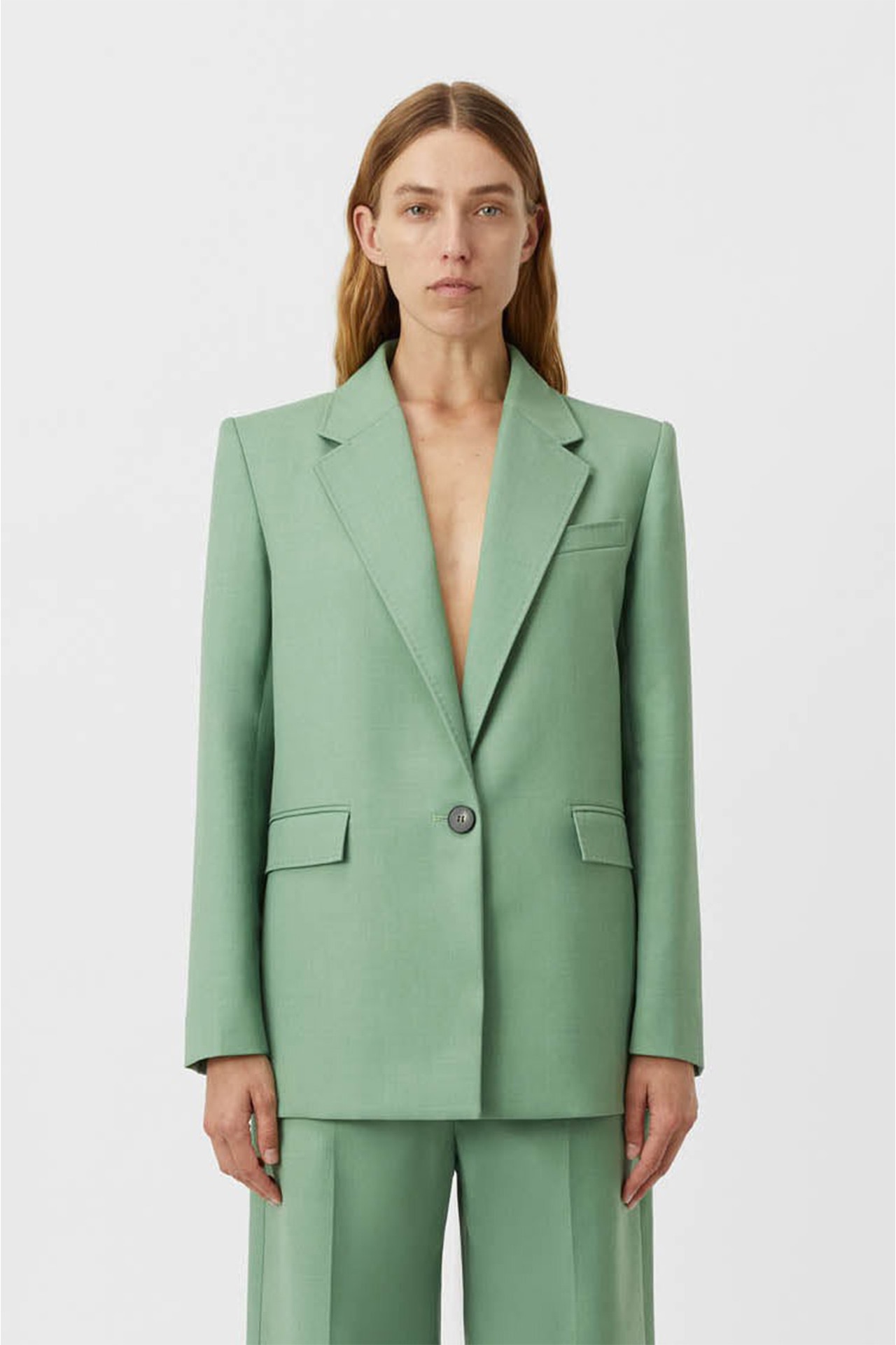 <h3><a href="https://www.camillaandmarc.com/" target="_blank" rel="nofollow noopener"><b>Camilla and Marc</b></a></h3><p><strong>Flora Blazer</strong></p><p>This oversized blazer from Camilla and Marc, which comes in this delectable light Eucalyptus green, is summer tailoring to a tee. The warmer seasons are the best time to experiment with colour, so make sure you&rsquo;re freshening up your workwear palette.</p><p><b>Type: </b>Blazer |<b> Material: </b>Polyester, wool, recycled polyester&nbsp;|<b> Colour: </b>Green | <b>Delivery:</b> Free shipping</p><p class="button-common"><a title="Shop now for $750" href="https://www.camillaandmarc.com/products/flora-blazer-light-eucalyptus" target="_blank" data-cta="Shop now for $750" data-editable="true">Shop now for $750</a></p><h3>How can I dress for work in the summer?</h3><p>Dressing for work during summer can certainly prove a challenge, but it can also be fun and relatively simple&mdash;you just have to consider a few things first. Where you can, opt for lightweight, breathable fabrics like linen and cotton to keep cool. Tailored shorts or lightweight trousers paired with a fresh blouse or a structured blazer can give you a polished vibe without overheating. Midi skirts are also a solid choice&mdash;cute, but still professional. And don&rsquo;t forget to accessorise! A pair of stylish sandals or flats, and some simple jewellery can really pull your look together while keeping it chill. Lighter colours are great too, helping you feel fresh and cool all day long.</p><h3>What is not appropriate to wear in an office in summer?</h3><p>The answer to this question all comes down to where you work. If you&rsquo;re in a creative industry perhaps, with more laid-back office rules, casual, beach-worthy attire might be perfectly acceptable. For majority of corporate-style offices however, while summer lets you mix it up a bit, there are probably still some no-gos. Open toe shoes, super short shorts, and tank tops (unless you layer with something) often don&rsquo;t cut it in the boardroom. Save the jeans and beachy outfits for the weekend, and instead opt for lightweight blouses and pants, midi skirts and slouchy blazers.</p><h3>Can you wear a summer dress to work?</h3><p>Definitely! A summer dress can be a great option for the office, so long as it has a polished silhouette and look. A belted waist adds a nice touch, and throwing on a blazer can elevate your look for meetings or client chats. Just make sure to avoid anything <em>too</em> casual. With the right accessories&mdash;think kitten heels or chic flats&mdash;your summer dress can easily take you from the office to off-duty.</p><p class="button-common"><a title="Vogue" href="javascript:rampart.signup('https://www.newsletters.news.com.au/vogue');" target="_self" data-cta="Vogue" data-editable="true">Sign up to our newsletter</a></p>