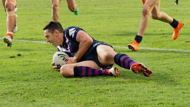 Billy Slater of the Storm dives over to score a try.