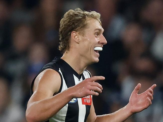 MELBOURNE, AUSTRALIA - MAY 12: Finlay Macrae of the Magpies celebrates a goal during the 2024 AFL Round 09 match between the Collingwood Magpies and the West Coast Eagles at Marvel Stadium on May 12, 2024 in Melbourne,