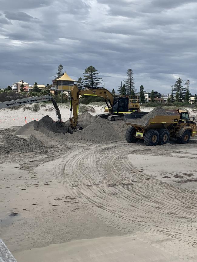 Sand carting at Semaphore beach this week. Picture: Paula Thompson