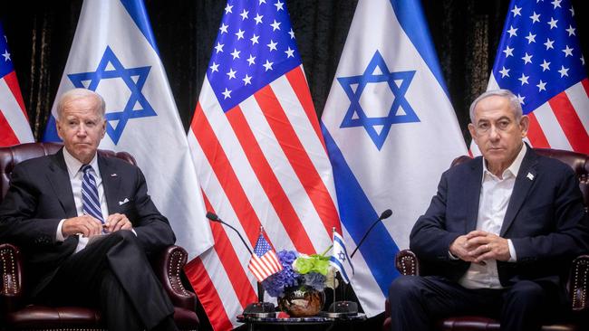 Former US president Joe Biden sits with Israeli Prime Minister Benjamin Netanyahu at the start of the Israeli war cabinet meeting in Tel Aviv in October 2023.