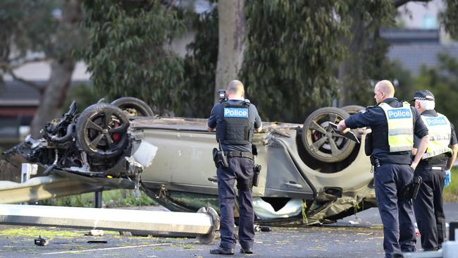 Police and emergency services at a fatal car crash on Plenty Rd, Bundoora in June. Picture: David Crosling