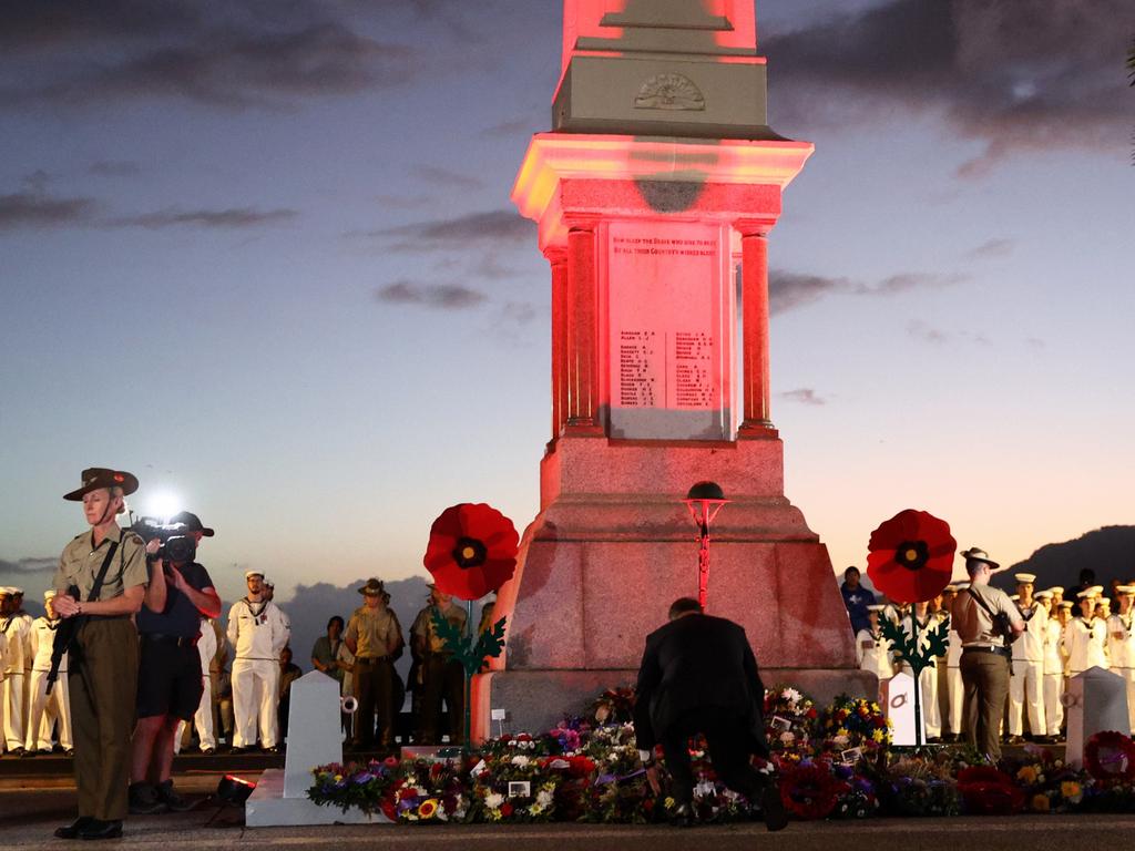 Hundreds of people gathered in the darkness of the early morning to pay their respects to the lives lost in war at the Cairns RSL sub branch Anzac Day dawn service, held at the Cairns Esplanade. Picture: Brendan Radke