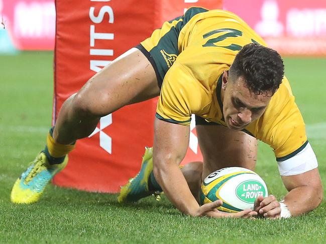 Matt Toomua of the Wallabies scores a try during the match against South Africa at Suncorp Stadium. Picture: Getty Images