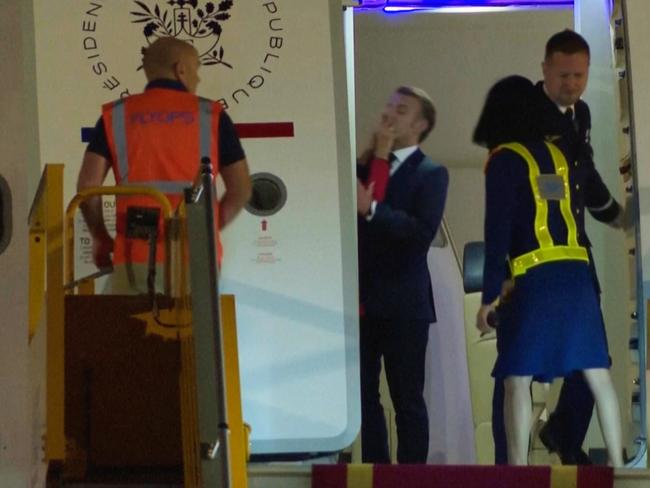 In this grab taken from video, France's President Emmanuel Macron prepares to disembark a plane on arrival, in Hanoi, Vietnam, Sunday, May 25, 2025. Picture: AP Photo/Hau Dinh