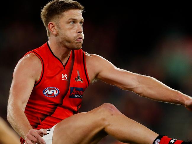 MELBOURNE, AUSTRALIA - APRIL 01: Jayden Laverde of the Bombers kicks the ball during the 2022 AFL Round 03 match between the Melbourne Demons and the Essendon Bombers at the Melbourne Cricket Ground on April 01, 2022 In Melbourne, Australia. (Photo by Dylan Burns/AFL Photos via Getty Images)