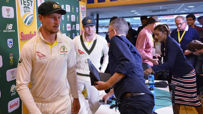 Steven Smith and Cameron Bancroft, left, leave the ill-fated media conference in Cape Town Picture: Getty Images