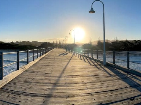 Kim Farlow captures the jetty in all its glory. Coffs cover image.