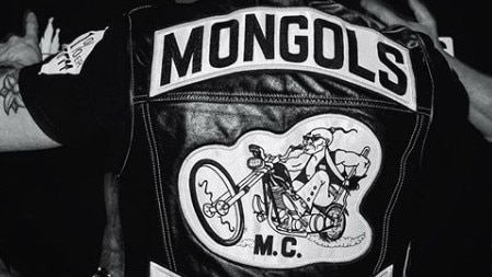 A Mongols bikie has been busted with drugs and prohibited weapons.