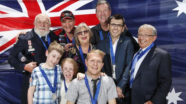 Victorian Pride of Australia medal presentation at the HWT Building. Award winners L-R back row - CFA officer Paul Bannan, Michael Gallus, Jude Donahoo, Neale Daniher, Jonathan Tarascio, Kevin Costa (standing for winner Simon Costa, L-R front brother and sister Hayden and Stephanie Rujak and Beau Vernon. Picture: David Caird