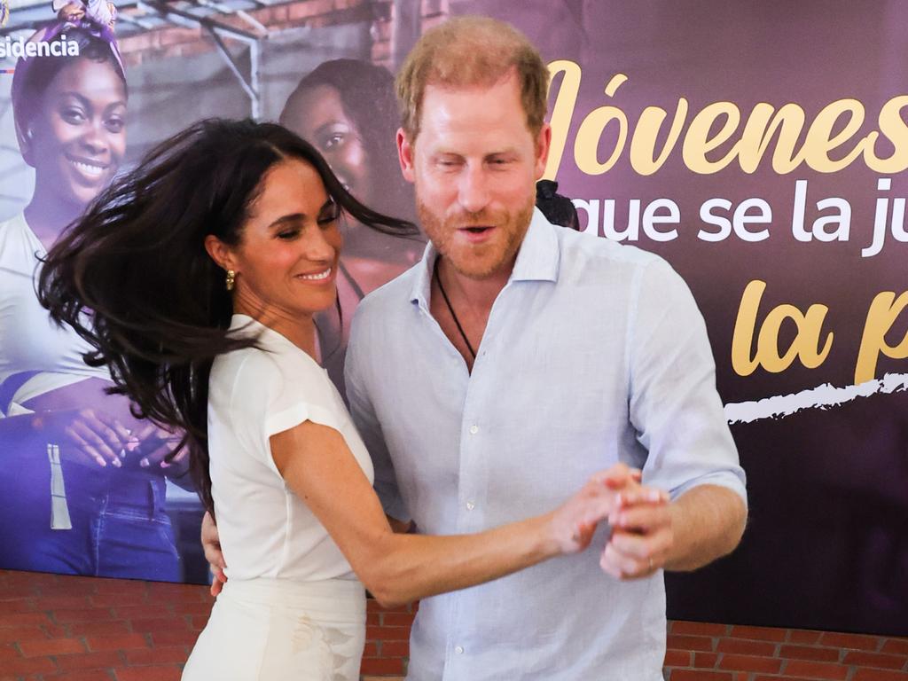 The royal with wife Meghan Markle during their Colombian tour. Picture: Getty Images