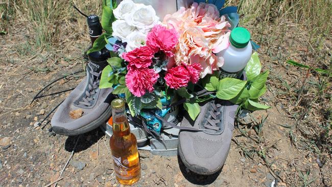 A pair of Brayden's shows, a couple of beers and some flowers were laid in memory of him in the months following the crash.