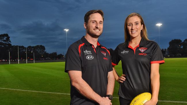 Dr Brendan Major, with captain Lisa Williams, is also the coach of Essendon’s AFLW side. Picture: Tony Gough