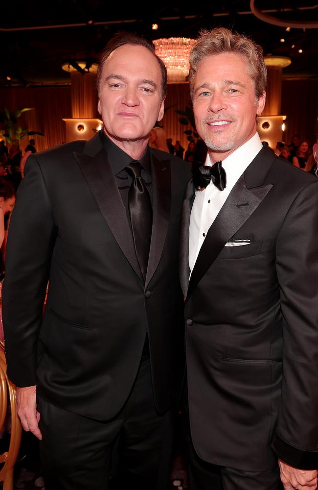 Quentin Tarantino and Brad Pitt opt for traditional suits. Picture: Getty Images