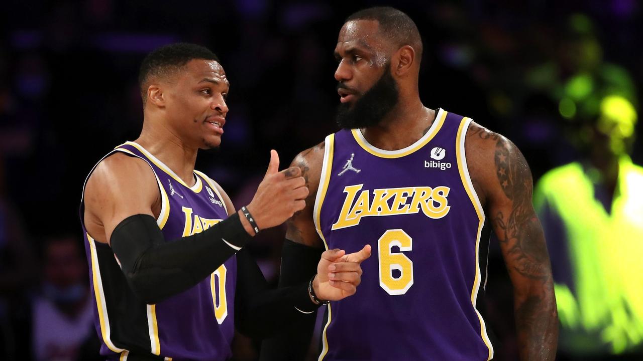 LOS ANGELES, CALIFORNIA - FEBRUARY 16: Russell Westbrook #0 and LeBron James #6 of the Los Angeles Lakers discuss a play during the first quarter against the Utah Jazz at Crypto.com Arena on February 16, 2022 in Los Angeles, California. NOTE TO USER: User expressly acknowledges and agrees that, by downloading and or using this Photograph, user is consenting to the terms and conditions of the Getty Images License Agreement. (Photo by Katelyn Mulcahy/Getty Images)