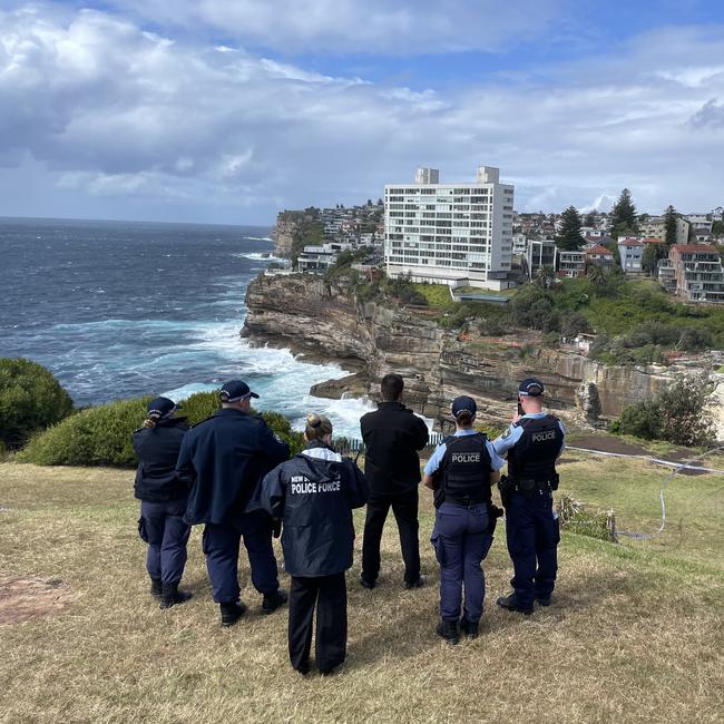 Police are at Diamond Bay Reserve after a body was spotted in the water below. Picture: Jack Evans