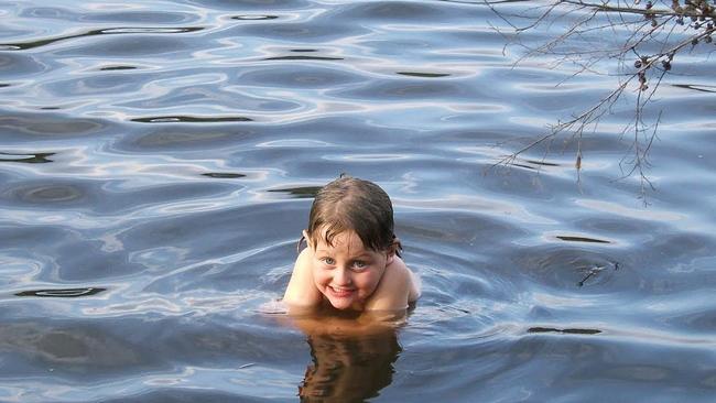 Darian swimming in Wentworth Falls Lake as a child