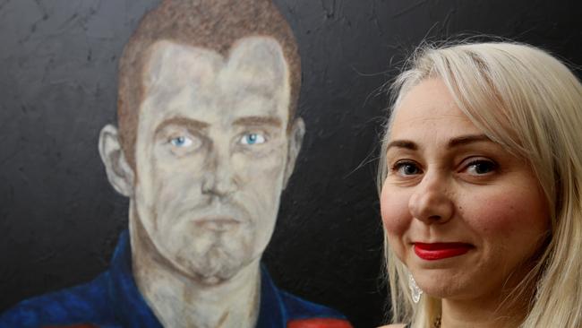 Sarah Key with her portrait of Alex McKinnon.