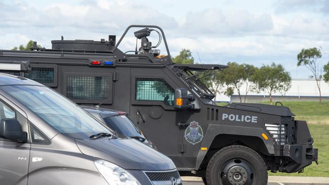 Heavily armoured police vehicles were at the scene. Picture: Jay Town