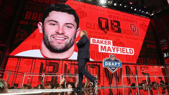 NFL Commissioner Roger Goodell walks past a video board displaying an image of Baker Mayfield of Oklahoma after he was picked #1 overall by the Cleveland Browns during the first round of the 2018 NFL Draft. Picture: AFP.