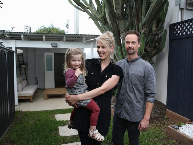 17/03/2022. Evan Blake and Jessie Schattner with daughter Sierra 3, at their home in Sydenham in Sydney's inner-west which is due to go to auction. The coming few weeks may be the last chance for sellers to capture the twilight of the current property boom. Britta Campion / The Australian