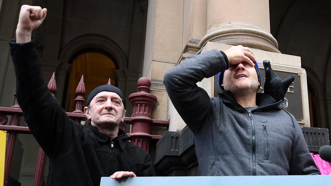 Supporters of abuse victims are seen outside the Supreme Court of Victoria, Melbourne, Wednesday, August 21, 2019. Cardinal George Pell's appeal has been dismissed by the Court of Appeal and he will remain in prison. (AAP Image/Julian Smith) NO ARCHIVING