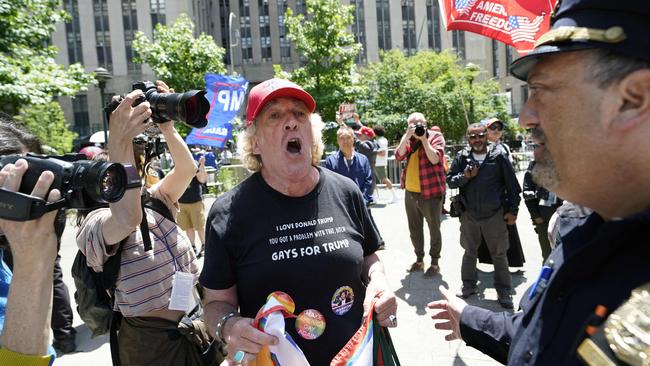 A pro-Trump demonstrator shouts as people waited for a verdict. Picture: TIMOTHY A. CLARY / AFP
