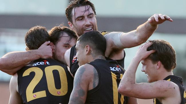 Tigers players celebrate a late goal during the Round 15 SANFL match between North Adelaide and Glenelg at Prospect Oval in Adelaide, Sunday, July 30, 2023. (SANFL Image/David Mariuz)