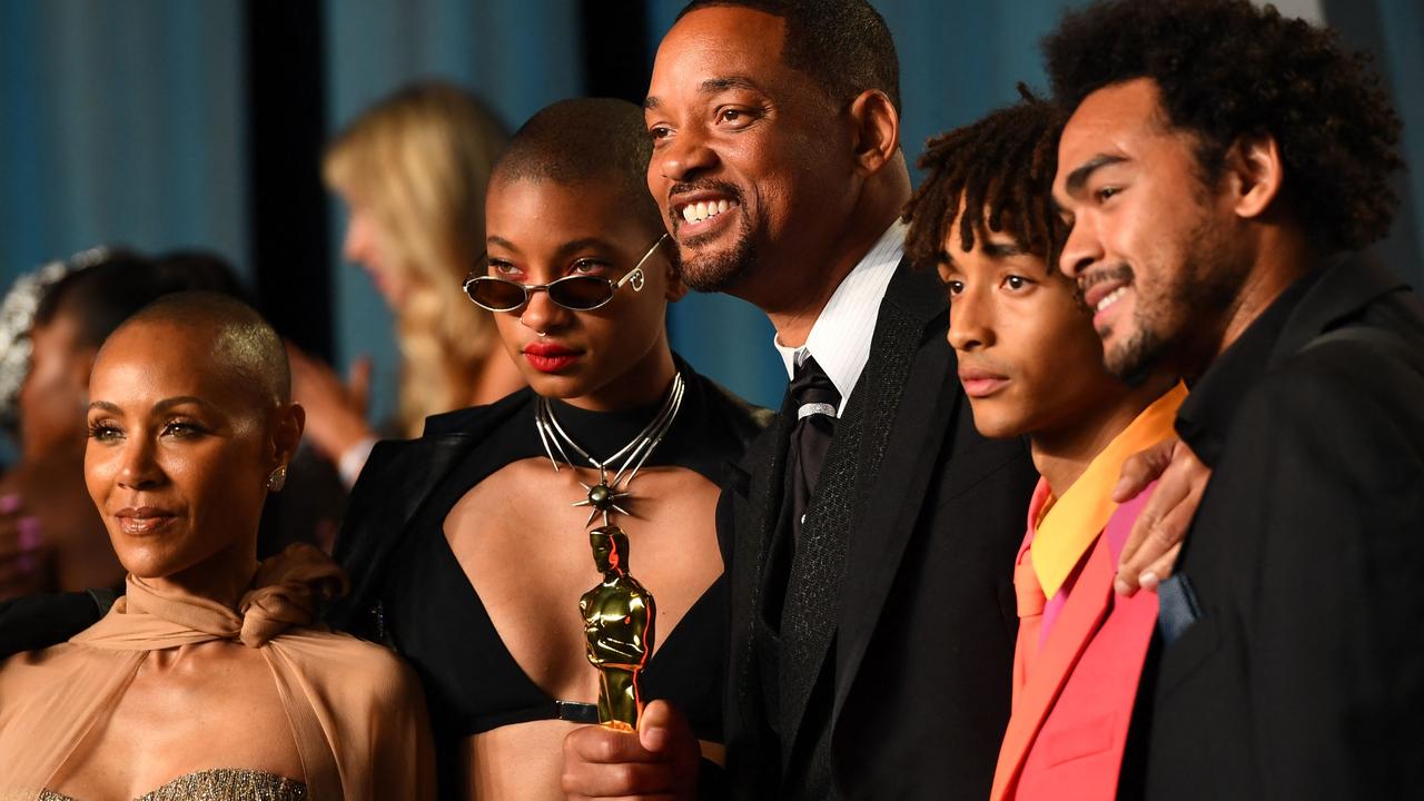 Smith posed with his Oscar alongside sons Trey Smith and Jaden Smith, daughter Willow Smith and wife Jada Pinkett Smith. Picture: AFP.