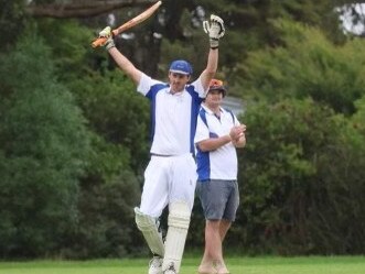 Ben King raises his bat. Picture: Jorja