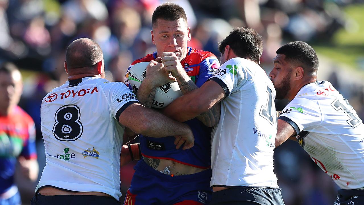 Matt Scott making a tackle in what would become his last NRL game. Picture: Tony Feder/Getty Images.