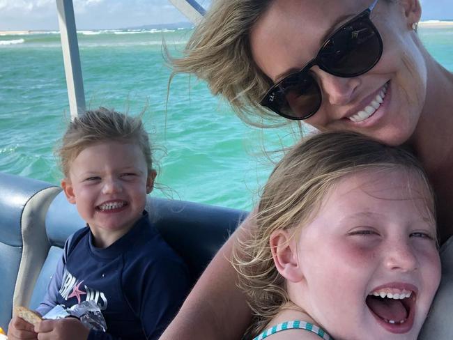 Kelly Landry enjoys a selfie with her daughters on a boat trip with Anthony Bell.