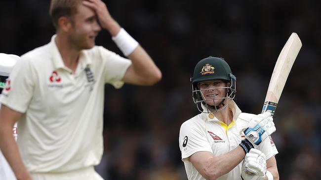 Steve Smith and Stuart Broad of England react during day four. Picture: Getty Images