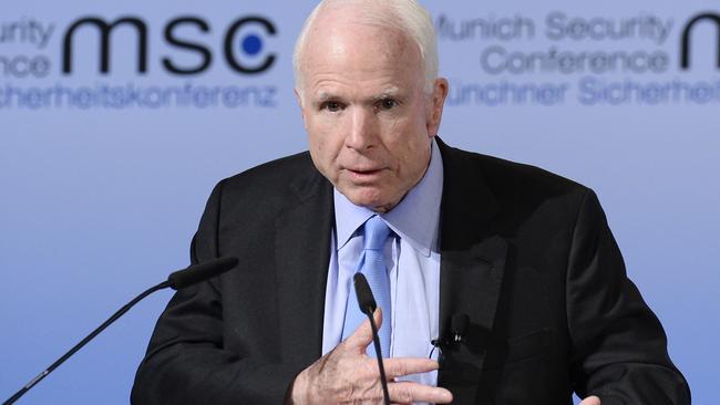 John McCain said Hillary Clinton needs to get over losing the 2016 presidential election. Picture: AFP.