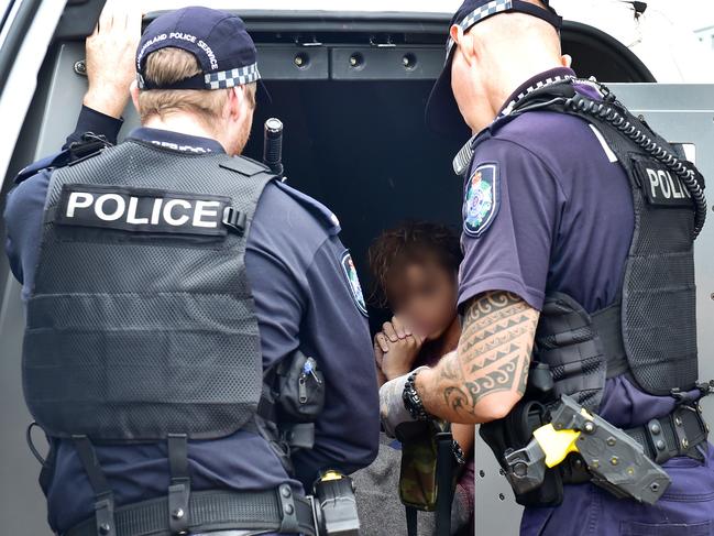 Police find and arrest two alleged juvenile offenders hiding in bushland south of Townsville near Cape Cleveland. Picture: Shae Beplate.