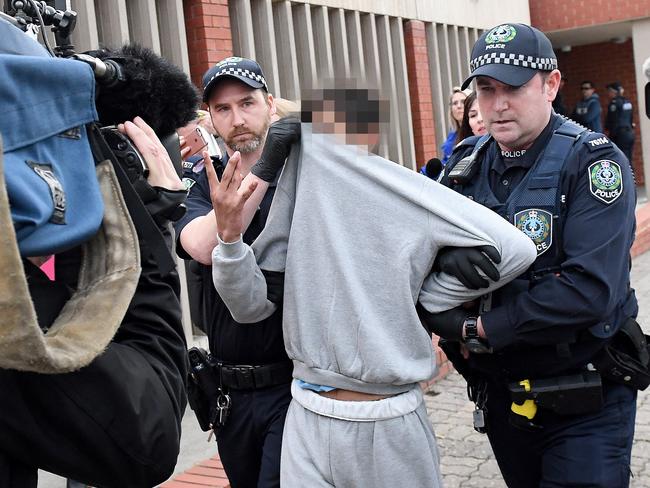 One of the three youths is rearrested over the hit-run death of Lucy Paveley outside Adelaide Magistrates Court. Picture: Naomi Jellicoe