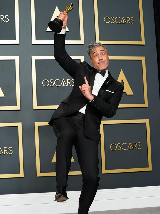 Taika Waititi, winner of Best Adapted Screenplay for "Jojo Rabbit," poses in the press room during the 92nd Annual Academy Awards in 2020.