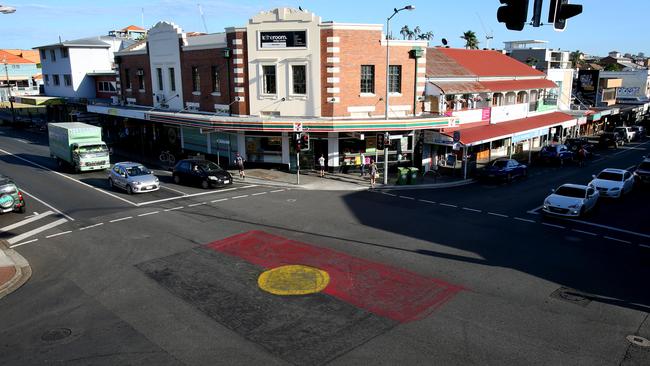 Aboriginal flag painted on the intersection of Vulture Street and Boundary Street West End. Picture: Renae Droop.