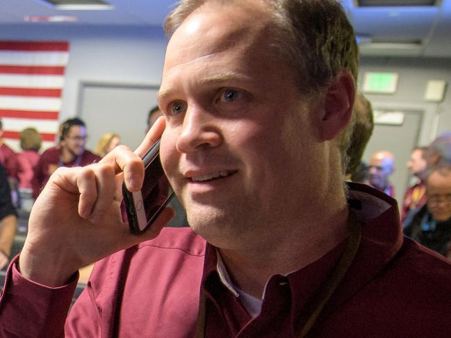 NASA Administrator Jim Bridenstine receives a congratulatory call from Vice President Mike Pence after receiving confirmation that the Mars InSight lander successfully touched down on the surface of Mars on November 26, 2018, inside the Mission Support Area at NASA's Jet Propulsion Laboratory in Pasadena, California. - Cheers and applause erupted at NASA's Jet Propulsion Laboratory as a $993 million unmanned lander, called InSight, touched down on the Red Planet and managed to send back its first picture. (Photo by Bill INGALLS / NASA / AFP) / RESTRICTED TO EDITORIAL USE - MANDATORY CREDIT "AFP PHOTO / NASA/ BILL INGALLS" - NO MARKETING NO ADVERTISING CAMPAIGNS - DISTRIBUTED AS A SERVICE TO CLIENTS