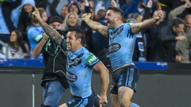 Mitchell Pearce celebrates after James Tedesco’s matchwinning try. Picture: AAP