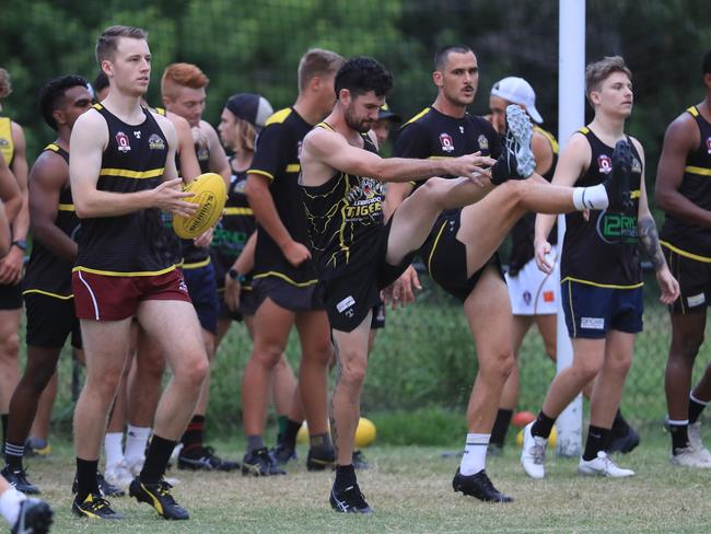 The Labrador Tigers QAFL (Australian rules) team training session. Pictured second from left is Billy Hicks, third from left is Jayden Young, far right is Emmanuel Baru. Picture: Scott Powick Newscorp