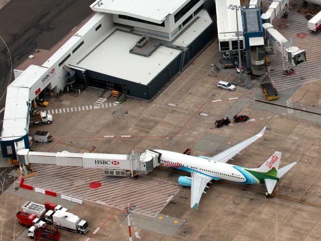 Overview of Qantas, Air Vanuatu and China Eastern International aircraft at International Terminal of Sydney Airport in Sydney.