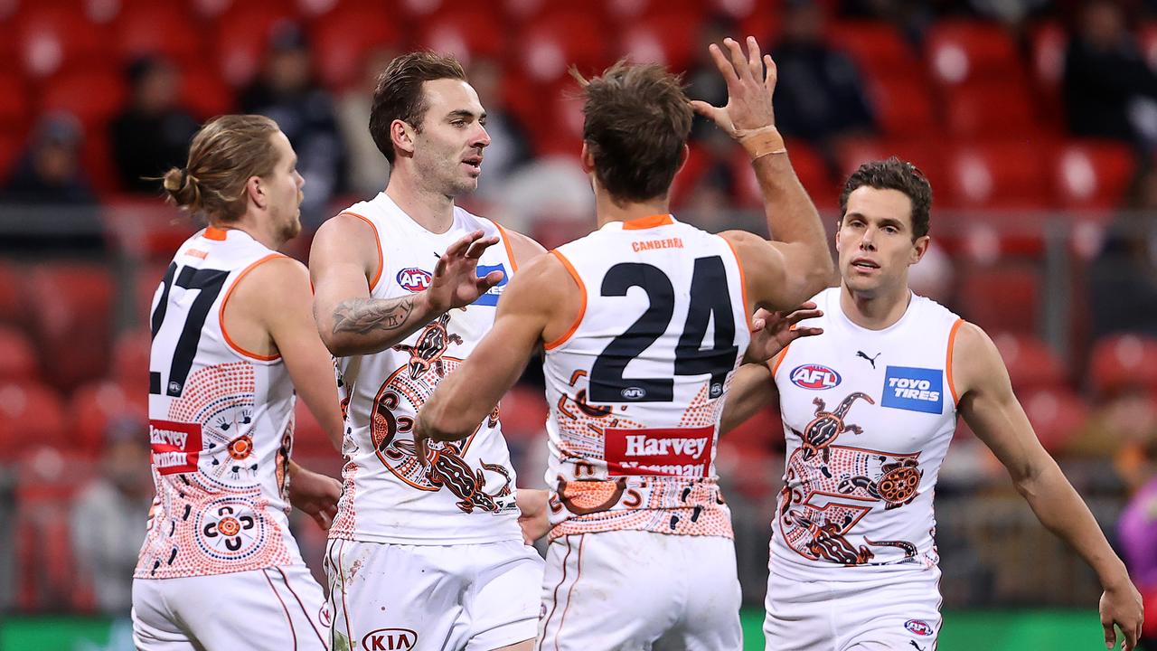SYDNEY, AUSTRALIA - JUNE 19: Jeremy Finlayson of the Giants is congratulated by team mates after kicking a goal during the round 14 AFL match between the Greater Western Sydney Giants and the Carlton Blues at GIANTS Stadium on June 19, 2021 in Sydney, Australia. (Photo by Mark Kolbe/Getty Images)