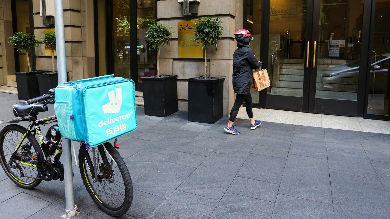 A food delivery rider drops off food at a Sydney quarantine hotel. Picture: NCA NewsWire / Gaye Gerard