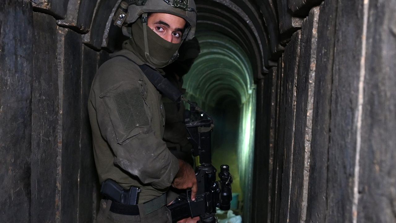 An IDF soldier stands in what the Israeli military says is a Hamas tunnel underneath the al-Shifa hospital complex. Picture: Ahikam Seri/AFP