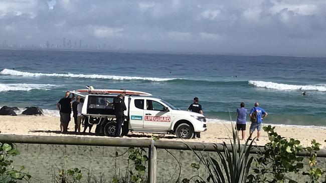 Lifeguards and emergency services at Greenmount beach this morning. Picture: Emily Halloran