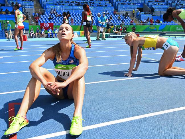USA’s Colleen Quigley, Australia’s Genevieve Lacaze and Ethiopia’s Etenesh Diro react at the end of the Women’s 3000m Steeplechase Final during the athletics event at the Rio 2016 Olympic Games at the Olympic Stadium in Rio de Janeiro on August 15, 2016. / AFP PHOTO / FRANCK FIFE
