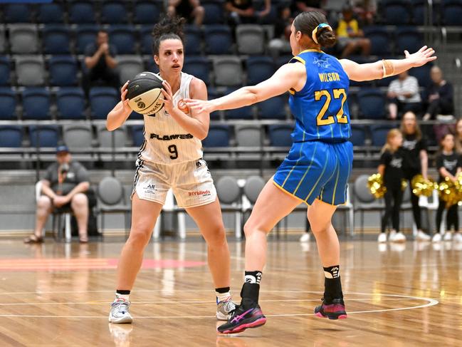 Vanessa Panousis of the Flames prepares to pass the ball during the round two WNBL match between Bendigo Spirit and Sydney Flames. Photo: Morgan Hancock/Getty Images