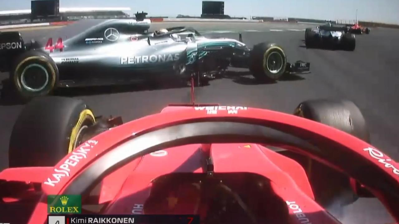 Lewis Hamilton spins after Kimi Raikkonen hit him on the opening lap of the British GP.